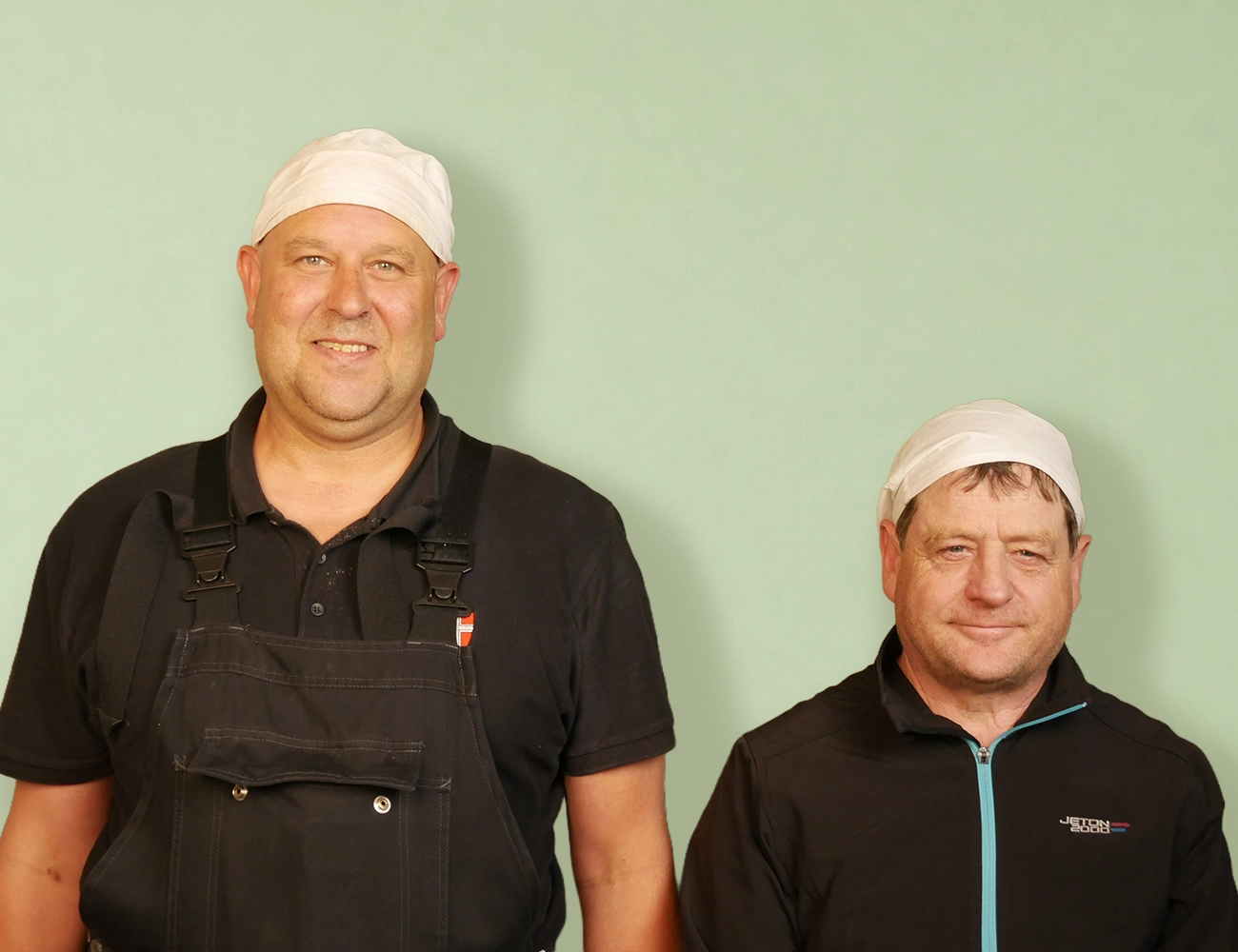 Rauchfangkehrer des Betriebs Hotzy bei der Arbeit